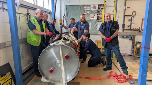 Group photo with cryostat