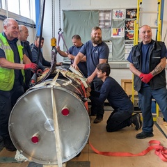 Group photo with cryostat